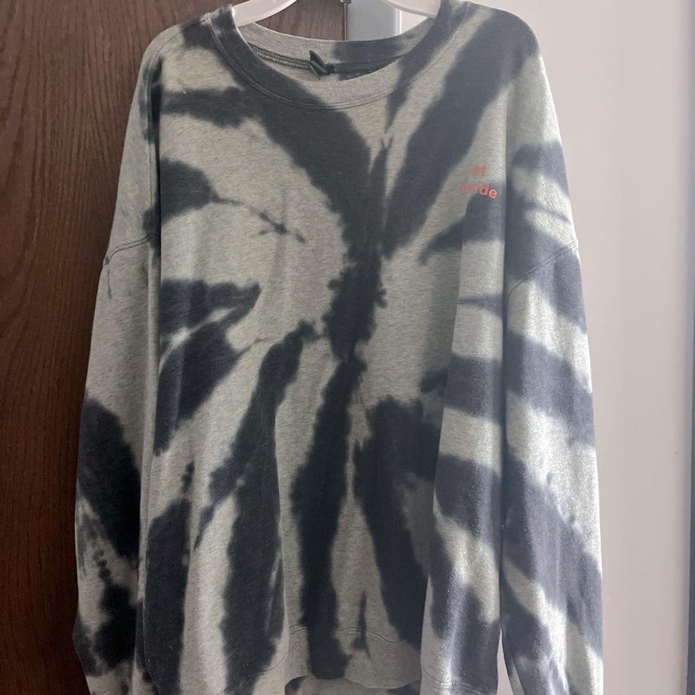 Sweater with graphic letters on the right side